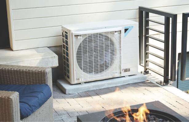 Daikin VRV Unit installed outside on a porch.