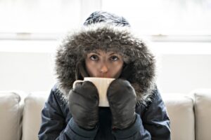 cold-woman-on-couch